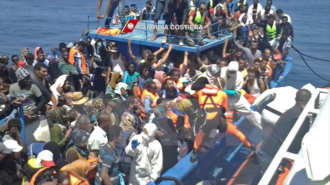 OECD: Sẽ có 450.000 người di cư được hưởng quy chế tị nạn lâu dài ảnh 1