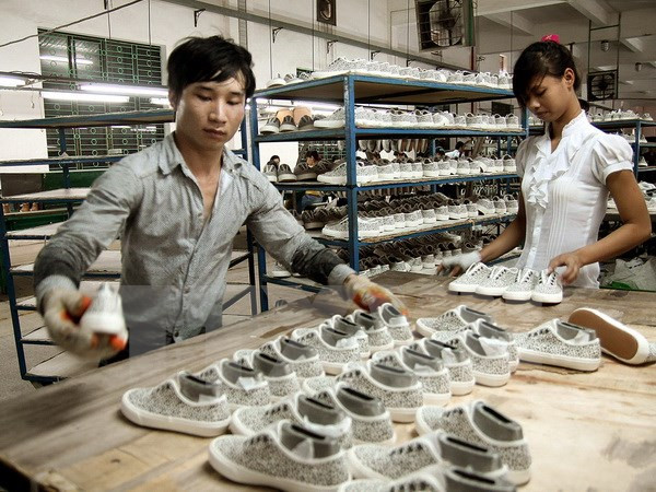 Ảnh minh họa. (Nguồn: TTXVN) Thực hiện thượng tôn pháp luật là con đường để phát triển kinh tế ảnh 1