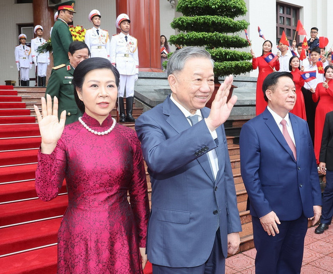 ttxvn_tong bi thu tien chu tich nuoc Lao.jpg