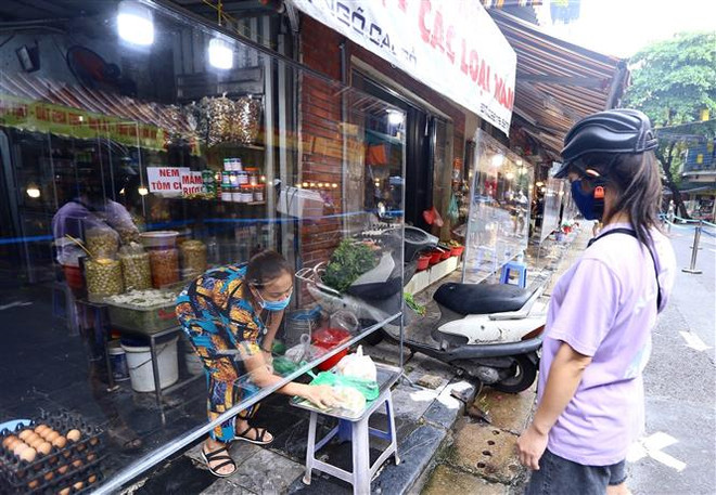 Cách thức nào để đưa nền kinh tế Việt Nam "thoát hiểm" trong đại dịch? ảnh 1