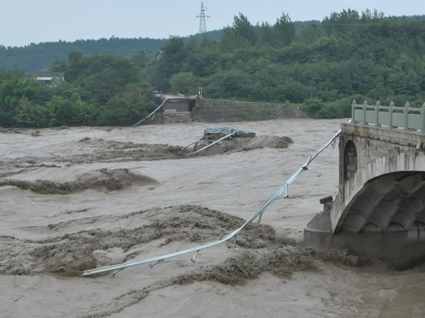 Trung Quốc tiếp tục mưa lũ, thời tiết tại Mỹ bất thường ảnh 1