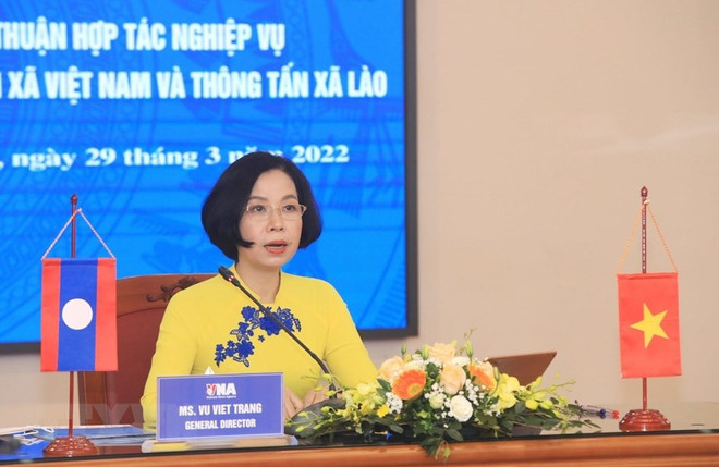Tổng Giám đốc TTXVN Vũ Việt Trang phát biểu tại buổi hội đàm và Ký kết Thỏa thuận Hợp tác nghiệp vụ theo hình thức trực tuyến ngày 29/3/2022. (Ảnh: Tuấn Anh/TTXVN) Quan hệ hợp tác chí nghĩa, chí tình giữa hai hãng thông tấn Việt-Lào ảnh 3