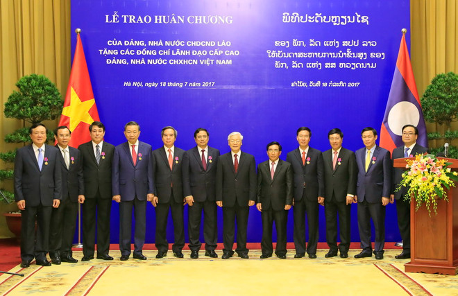Đảng, Nhà nước Lào trao phần thưởng cao quý tặng lãnh đạo Việt Nam ảnh 2
