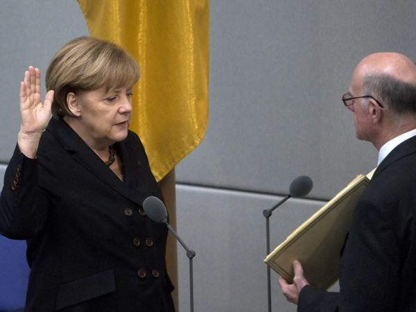 Thủ tướng Đức Angela Merkel tuyên thệ nhậm chức nhiệm kỳ thứ ba ngày 17/12. (Nguồn: AFP/TTXVN) Đa số người dân Đức thất vọng về chính phủ liên minh ảnh 1