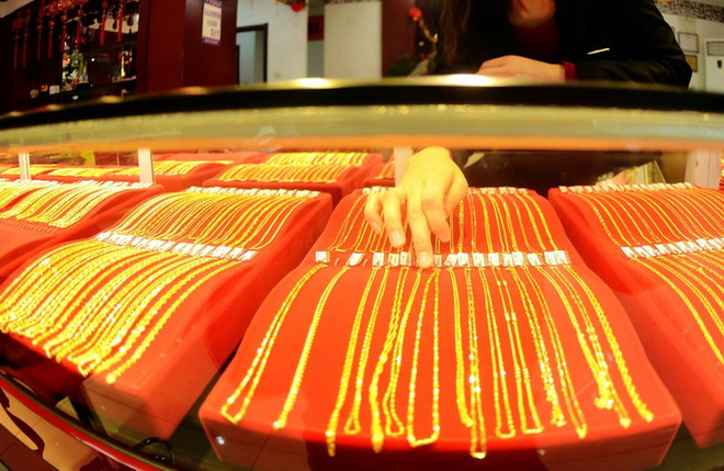 Đồng USD tăng mạnh gây sức ép khiến giá vàng châu Á giảm nhẹ ảnh 1