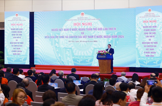 Thủ tướng Phạm Minh Chính phát biểu tại Hội nghị người Việt Nam ở nước ngoài trên toàn thế giới lần thứ IV. (Ảnh: Dương Giang/TTXVN) ttxvn_thu tuong pham minh chinh phat bieu (2).jpg