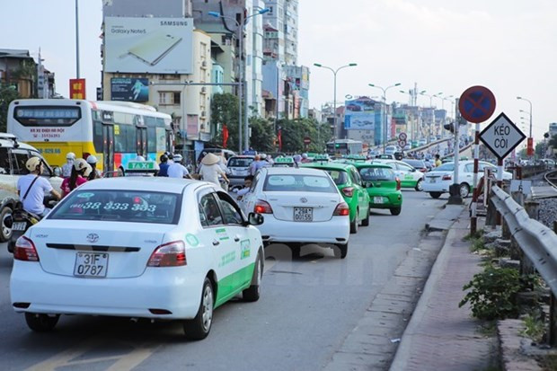 Hà Nội chấp thuận cho 200 xe taxi Mai Linh được hoạt động vận tải. (Ảnh: Minh Sơn/Vietnam+) Hà Nội chấp thuận cho 200 xe taxi Mai Linh được hoạt động vận tải ảnh 1