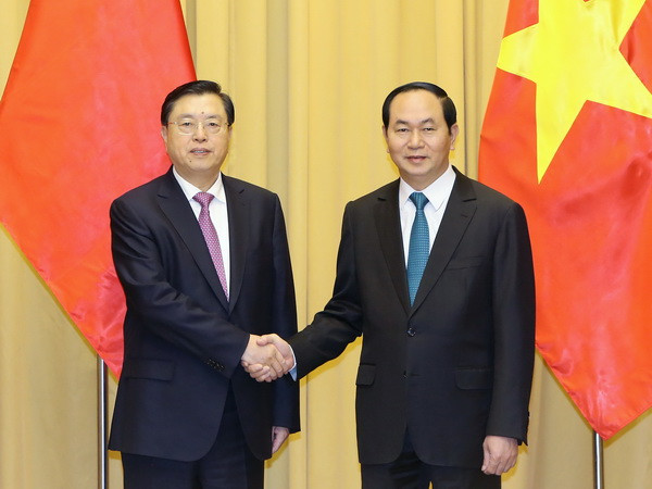 Chủ tịch nước Trần Đại Quang đã tiếp Ủy viên Thường vụ Bộ Chính trị, Ủy viên trưởng Ủy ban Thường vụ Đại hội đại biểu nhân dân toàn quốc (Nhân đại) Trung Quốc Trương Đức Giang. (Ảnh: Nhan Sáng/TTXVN) Chủ tịch nước tiếp Ủy viên trưởng Nhân đại Trung Quốc Trương Đức Giang ảnh 1