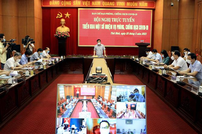 Các địa phương bảo đảm vừa phòng chống COVID-19 vừa phát triển kinh tế ảnh 1