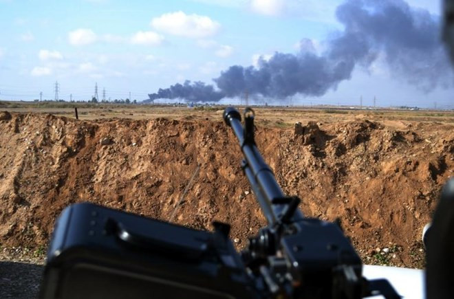 Libya mong quốc tế giúp bảo vệ các mỏ dầu có nguy cơ bị IS tấn công ảnh 1