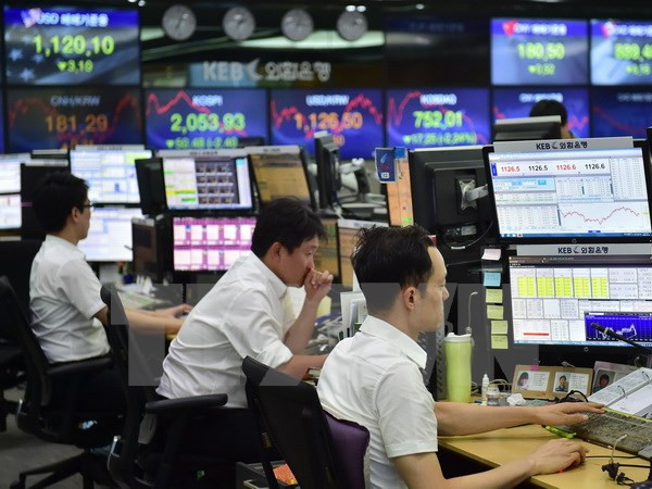 Sắc xanh bao phủ các sàn giao dịch chứng khoán ở châu Á ảnh 1