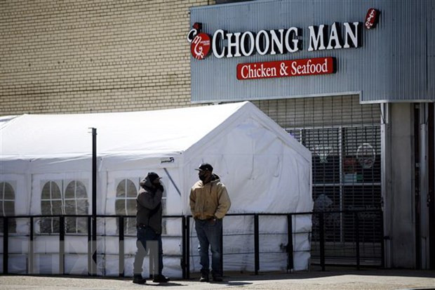 Thêm một mùa Hè khó khăn của nước Mỹ do ảnh hưởng dịch COVID-19 ảnh 2