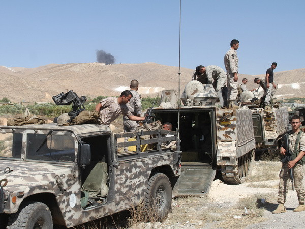 Qatar thuyết phục nhóm IS trả tự do cho các con tin Liban ảnh 1