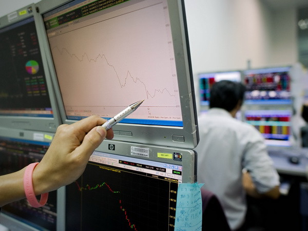 Chứng khoán châu Á khởi đầu tuần mới trong tâm lý thận trọng ảnh 1