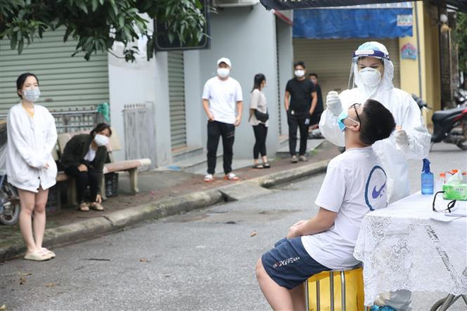 Hà Nội ứng phó với số ca mắc COVID-19 tăng nhanh ngoài cộng đồng ảnh 1