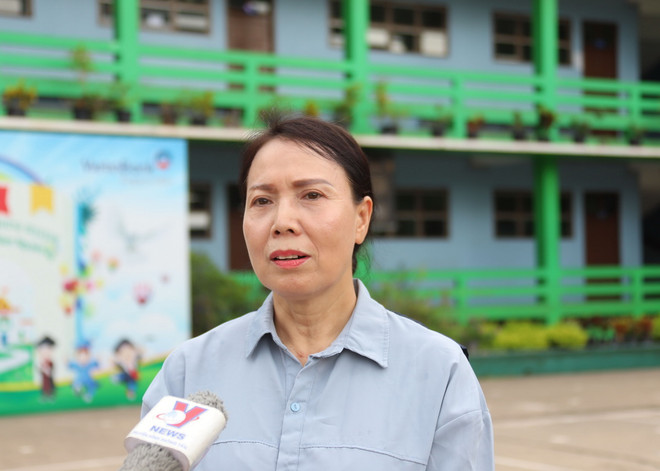 Hiệu trưởng Trường Song ngữ Lào-Việt Nam Nguyễn Du Nguyễn Thị Thanh Hương đánh giá về vai trò của Tổng Bí thư Nguyễn Phú Trọng trong quan hệ Việt Nam-Lào. (Ảnh: Xuân Tú/TTXVN) ttxvn_kieu bao lao tong bi thu (2)_resize.jpg