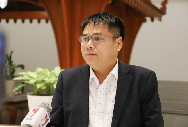 Phó Chủ tịch Hội Doanh nghiệp Việt Nam tại Lào Hoàng Văn Quân chia sẻ cảm xúc khi hay tin Tổng Bí thư Nguyễn Phú Trọng từ trần. (Ảnh: Xuân Tú/TTXVN) ttxvn_kieu bao lao tong bi thu (1)_resize.jpg