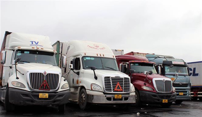 Nhiều xe nông sản, đông lạnh vẫn ra cửa khẩu Móng Cái chờ xuất khẩu ảnh 1