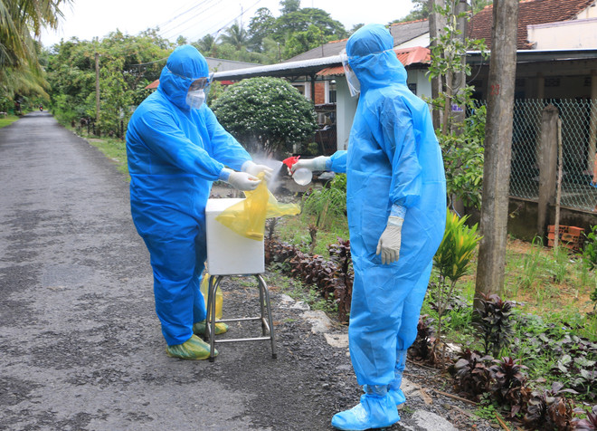 Vĩnh Long: Hỗ trợ người dân yên tâm giãn cách, đồng hành chống dịch ảnh 1