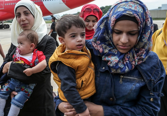 Người tị nạn Syria. (Nguồn: AFP/TTXVN) Mỹ gắng hoàn thành mục tiêu tiếp nhận 10.000 người tị nạn Syria ảnh 1