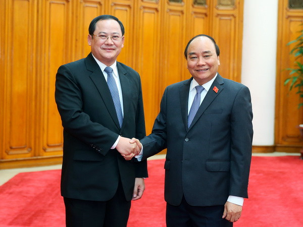 Thủ tướng Nguyễn Xuân Phúc tiếp Phó Thủ tướng Lào Sonsay Siphandone ảnh 1