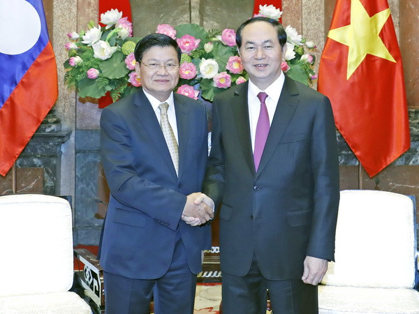Chủ tịch nước Trần Đại Quang tiếp Thủ tướng Lào Thongloun Sisoulith ảnh 1