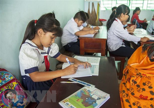 Ảnh chỉ có tính minh họa. (Nguồn: TTXVN) Những tiết học tràn đầy niềm vui, hứng khởi của học trò nghèo vùng sâu ảnh 1