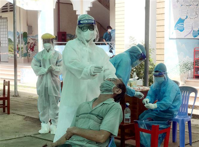 Bình Dương, Vĩnh Long nỗ lực sàng lọc, tách F0 ra khỏi cộng đồng ảnh 2