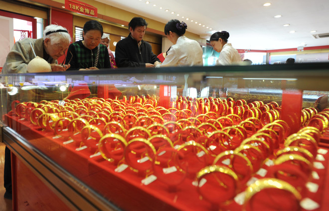 Trung Quốc tiêu thụ vàng nhiều nhất thế giới năm 2013 ảnh 1