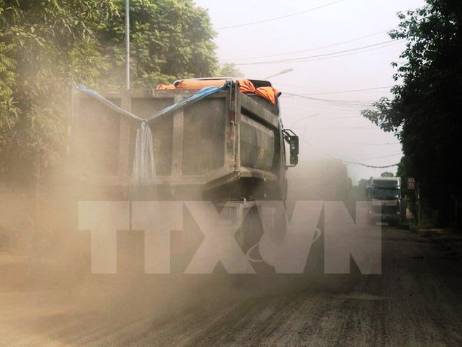 Ô nhiễm bụi tại các khu đô thị lớn tiếp tục ở ngưỡng báo động ảnh 1