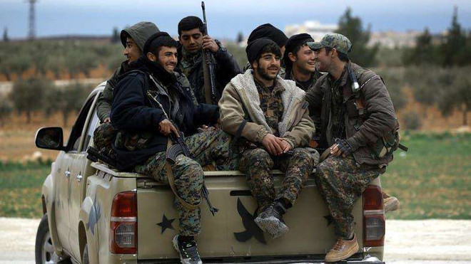 Lực lượng phiến quân Syria. (Nguồn: AFP) Phiến quân Syria kích nổ bom nhằm trúng đội tuần tra Nga-Thổ Nhĩ Kỳ ảnh 1