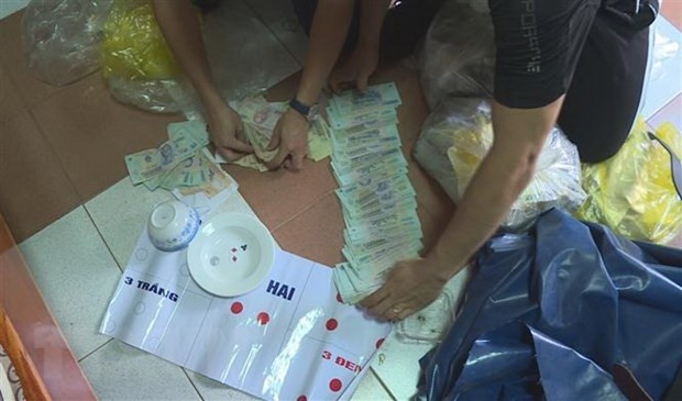 Phó GĐ Trung tâm Dịch vụ đấu giá tài sản bị bắt quả tang đánh bạc ảnh 1