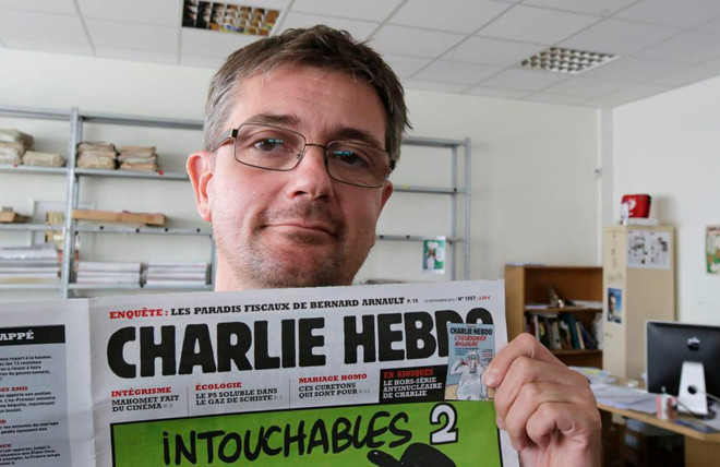 Charlie Hebdo tiếp tục đăng tranh biếm họa nhà tiên tri Mohammed ảnh 1