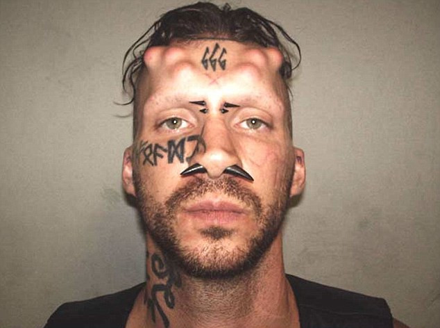 Nghi can giết người và chặt xác nạn nhân có ngoại hình “quỷ dữ” ảnh 1