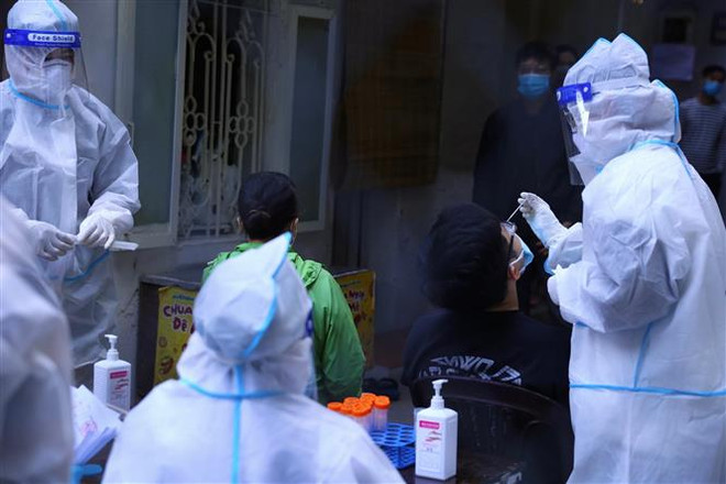 Ngày 6/12: Ghi nhận 14.591 ca nhiễm mới COVID-19, 223 ca tử vong ảnh 1