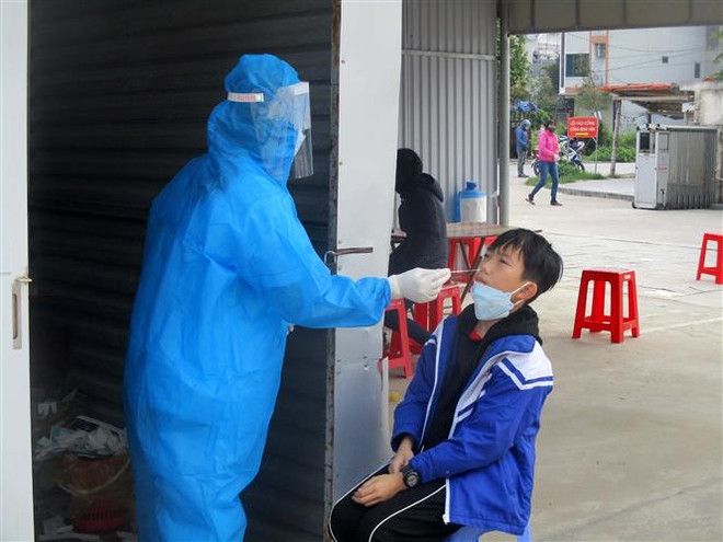 Ngày 23/2: Số ca nhiễm mới COVID-19 đã vượt mốc 60.000 ca ảnh 1