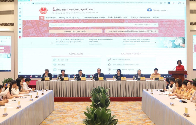 Họp báo công bố việc tích hợp thêm 6 dịch vụ công trên Cổng Dịch vụ công Quốc gia. (Ảnh: Văn Điệp/TTXVN) Đưa dịch vụ công đăng ký ôtô, xe máy trực tuyến vào vận hành từ 15/8 ảnh 1