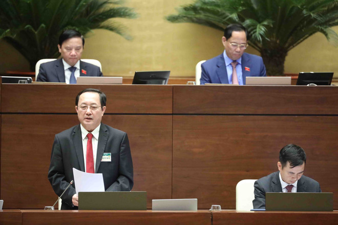 Bộ trưởng Bộ Khoa học và Công nghệ Huỳnh Thành Đạt trả lời chất vấn. (Ảnh: Minh Đức/TTXVN) Đại biểu QH: Phiên chất vấn dân chủ, thẳng thắn, trách nhiệm cao ảnh 2