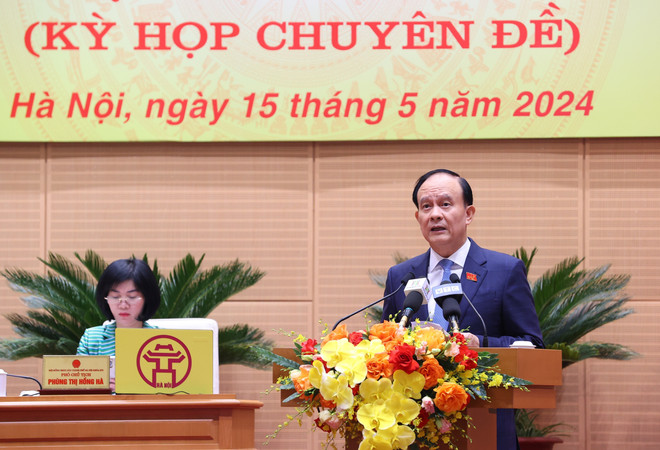 Chủ tịch Hội đồng Nhân dân thành phố Hà Nội Nguyễn Ngọc Tuấn phát biểu khai mạc. (Ảnh: Văn Điệp/TTXVN) TTXVN_1505Hoidongnhandan3.jpg