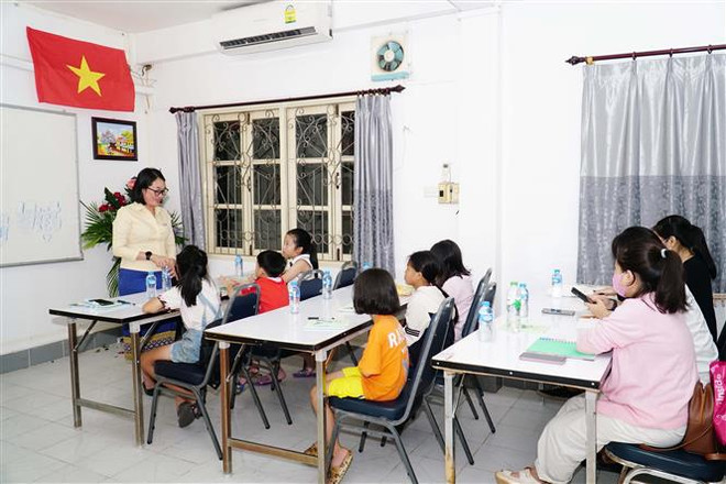 Giữ gìn và lan tỏa ngôn ngữ mẹ đẻ trong cộng đồng người Việt tại Lào ảnh 1
