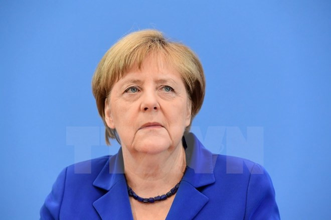 Thủ tướng Đức chỉ trích việc chặn người tị nạn ở các nước Balkan ảnh 1