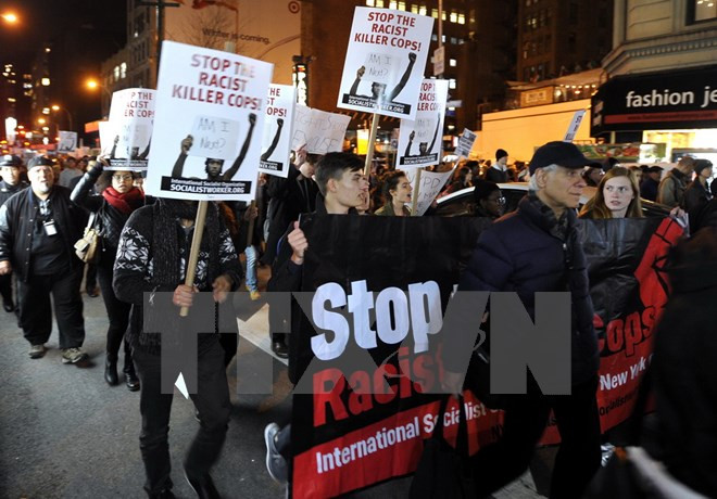 Tổng thống Obama: Mỹ đã bớt chia rẽ trong vấn đề chủng tộc ảnh 1