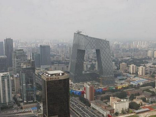 Ông Tập Cận Bình kêu gọi dừng xây dựng công trình kiến trúc kỳ lạ ảnh 1