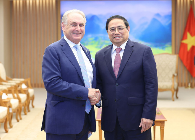 Thủ tướng Phạm Minh Chính tiếp Bộ trưởng Thương mại và Du lịch Australia Don Farrell. (Ảnh: Dương Giang/TTXVN) Thủ tướng tiếp Bộ trưởng Bộ Thương mại và Du lịch Australia ảnh 1