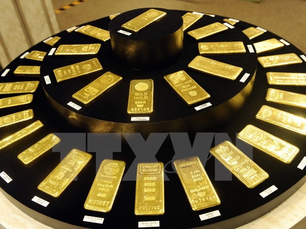 Giá vàng giao ngay chạm mức cao nhất trong một tháng qua ảnh 1