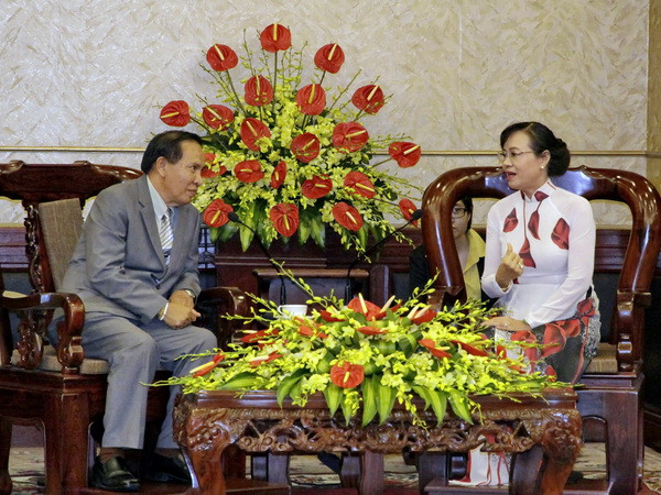 Thúc đẩy giao lưu công tác mặt trận giữa TP.HCM và thủ đô của Lào ảnh 1