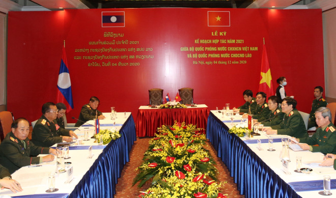 Bộ Quốc phòng hai nước Việt Nam-Lào ký Kế hoạch hợp tác năm 2021 ảnh 1