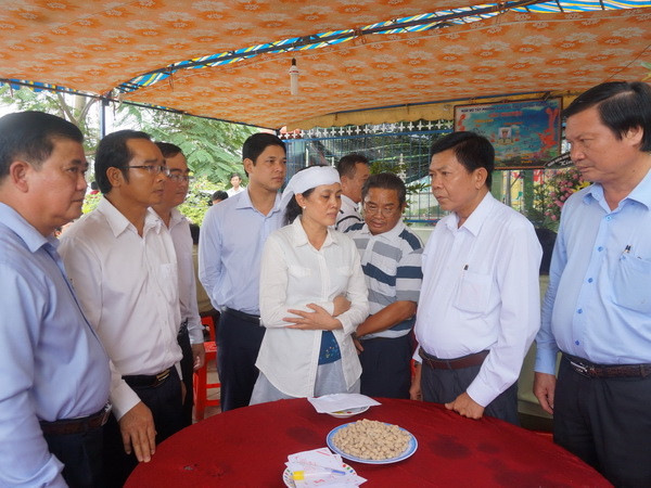 Hỗ trợ vật chất gia đình cán bộ QLTT thiệt mạng khi chống buôn lậu ảnh 1