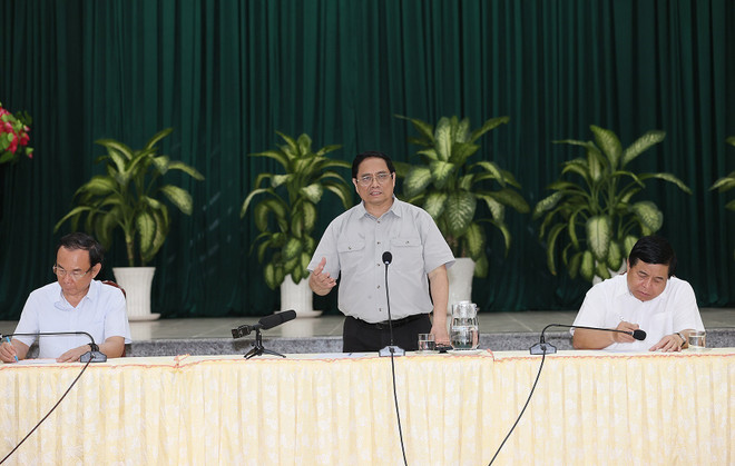 Thủ tướng Phạm Minh Chính làm việc với lãnh đạo huyện Cần Giờ. (Ảnh: Dương Giang/TTXVN) Thủ tướng Phạm Minh Chính: Xây dựng Cần Giờ là thành phố trong rừng ảnh 1