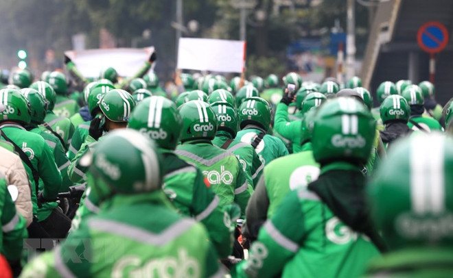 Grab tăng giá cước đã tác động kép đến cả tài xế và ‘thượng đế’ ảnh 1
